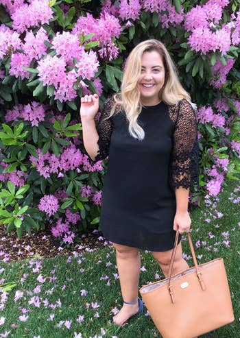 reviewer in the black lace sleeve midi dress