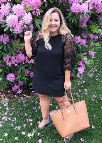 reviewer in the black lace sleeve midi dress