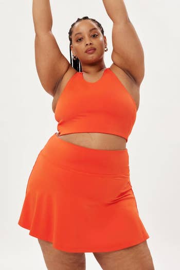 model wearing the Milo bra in orange