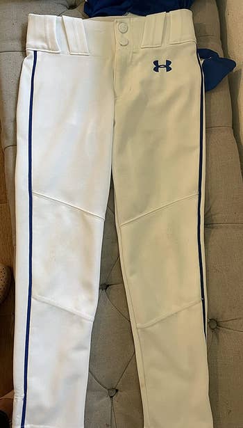 same reviewer's after photo showing the pants looking spotless