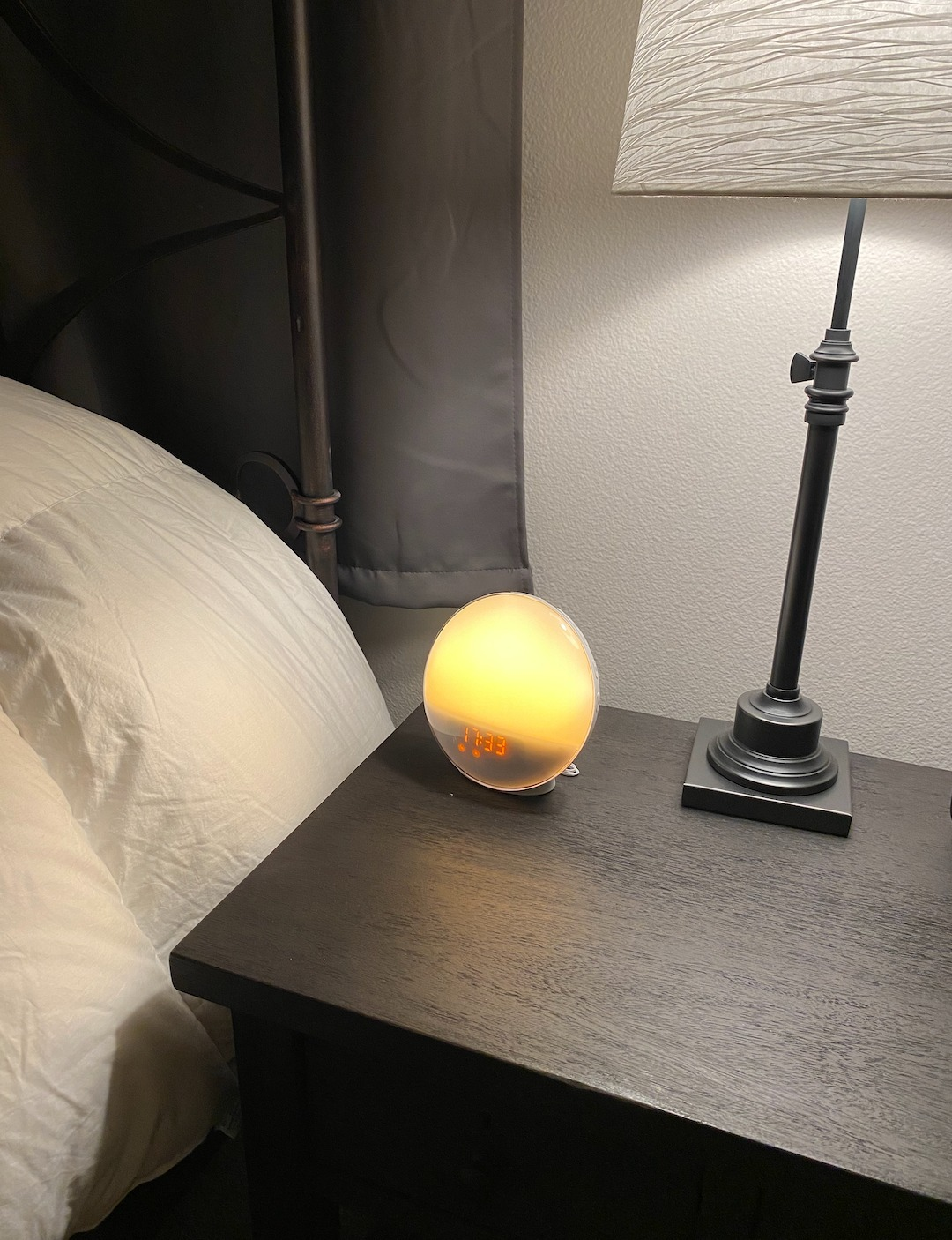 The circular alarm clock with the time stamp on it 