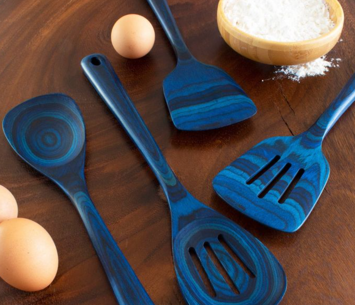 two wooden spoons and two spatulas, all with a blue tie-dye design