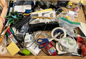 reviewer before photo of a mess inside their drawer