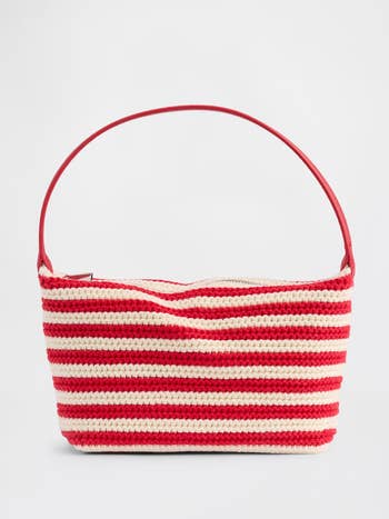 Striped woven handbag with a azygous  handle, suitable for casual outings