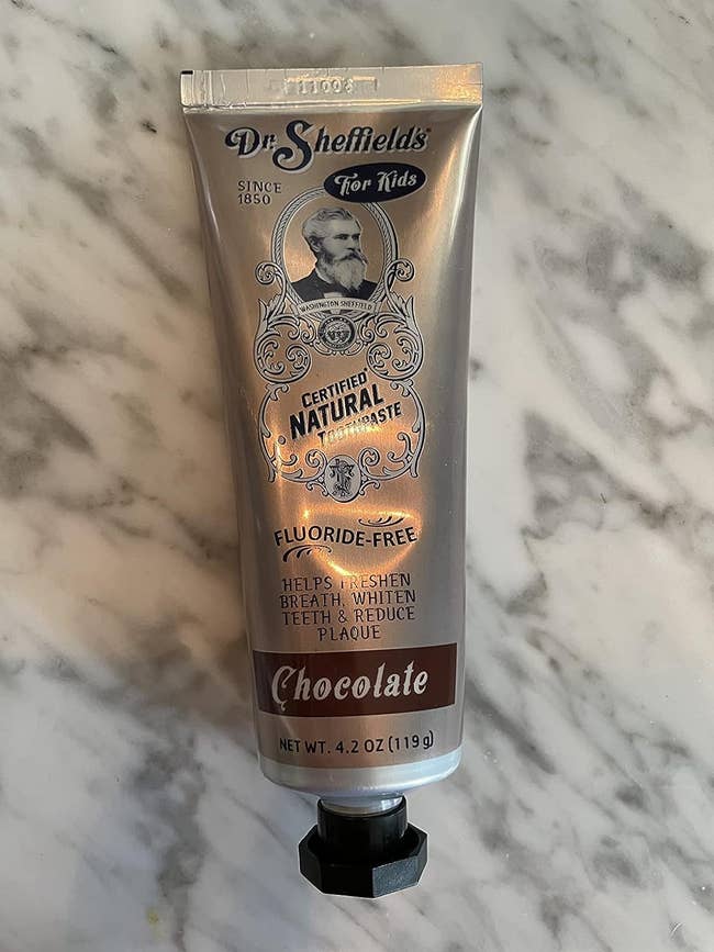 a tube of dr sheffields chocolate toothpaste