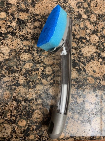 Reviewer's dishwand sitting on their counter