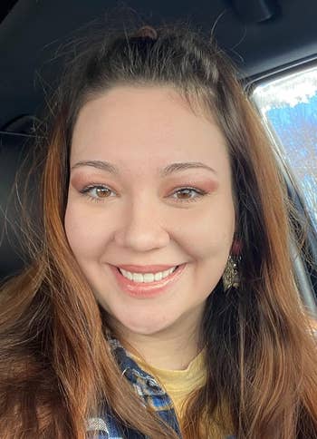 reviewer with reddish eyeshadow on