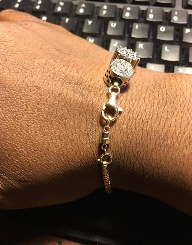 reviewer closeup of bracelet using clasp