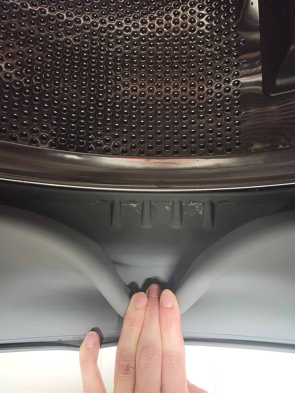 after photo of the same washing machine and all the mold is gone from the gasket