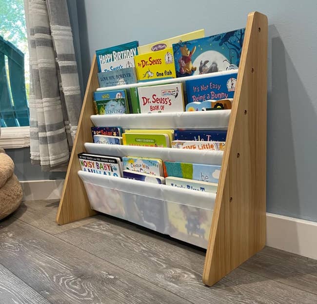a reviewer photograph of the publication rack loaded with children's books successful achromatic