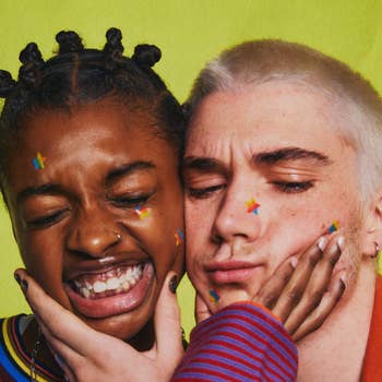 two models wearing the rainbow star pimple patches on their faces
