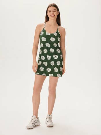 model wearing bold flower printed dress