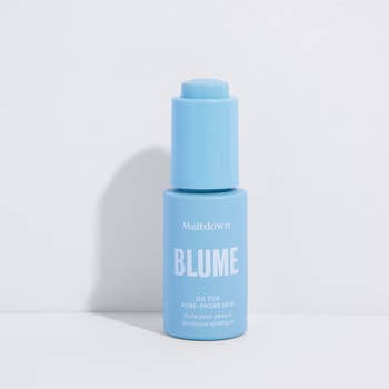 the blue bottle of acne oil