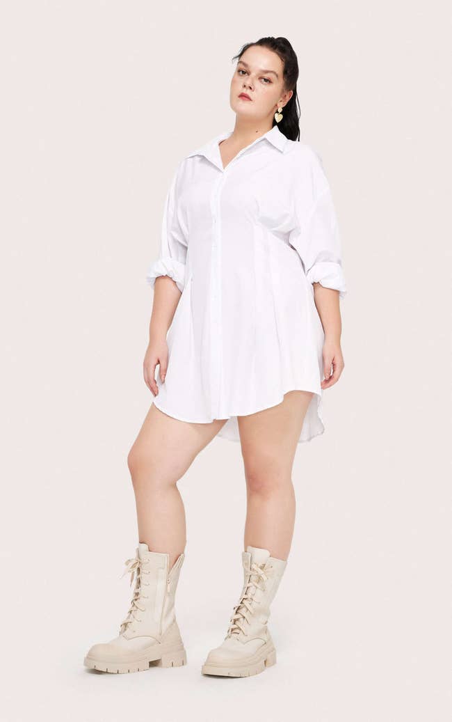 model wearing white corset dress