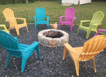 review pic of the stakes around a fire pit next to each chair