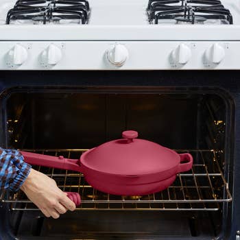 red pan in an oven