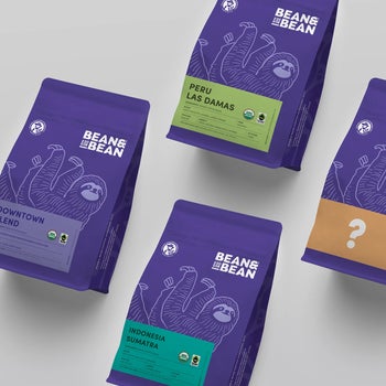 the four bags of coffee, including one mystery bag with a question mark on it