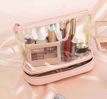 product image of makeup products in clear pink makeup bag