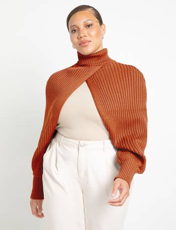 model wearing brown turtleneck sweater scarf