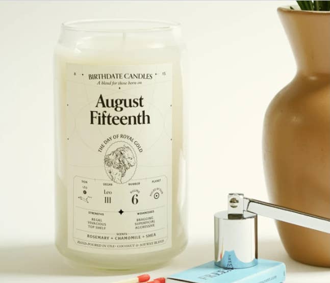 the August 15th candle in tall clear jar