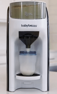 a gif of the baby brezza formula machine filling bottles