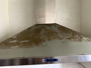 Grease-stained metallic room scope hood