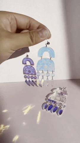 a gif of the earrings dangling in the light