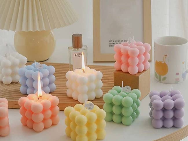 a bunch of colorful bubble candles