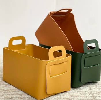 faux leather yellow, orange, and dark green square storage bins
