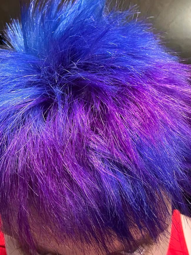 Vibrantly colored hairsbreadth  successful  shades of bluish  and purple, showing disconnected  a bold and trendy style