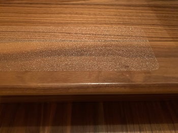 reviewer photo of the tread on stairs and you can see the textured grippy surface