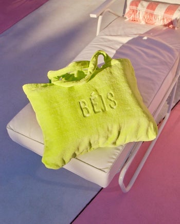 citron towel tote bag sitting on a pool chair