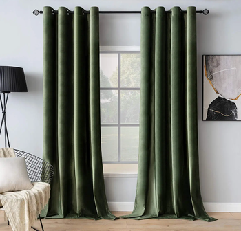 two green velvet curtains