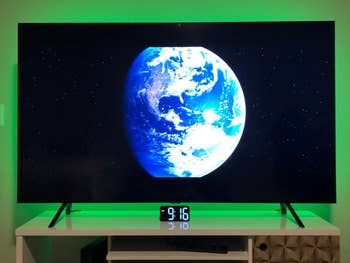TV backlit with green light 