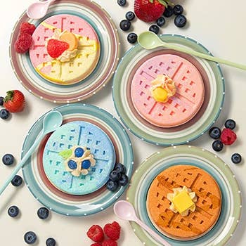 different color waffle and topping shaped bath bombs displayed on plates