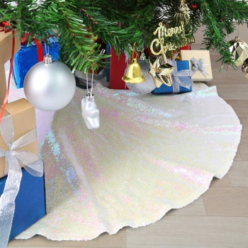 a white sparkly tree skirt