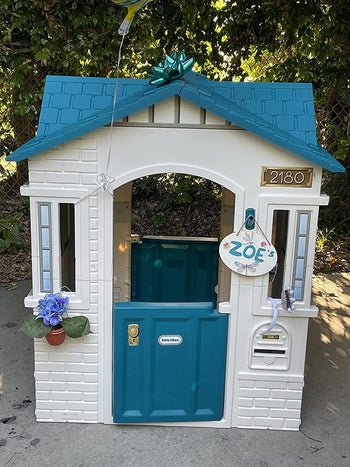 reviewer image of the playhouse outside