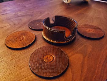 reviewer photo of leather coasters and holder