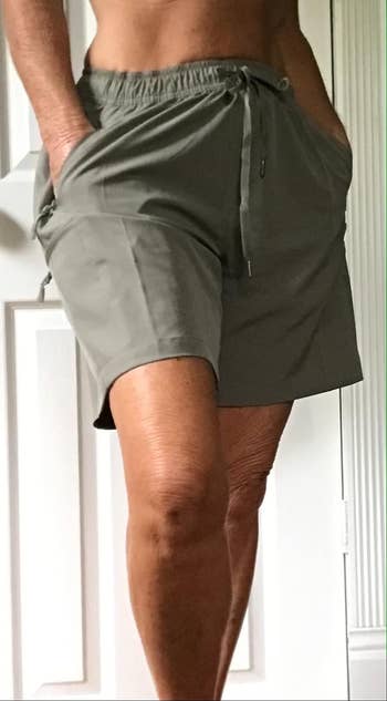 Reviewer in casual grey cargo shorts