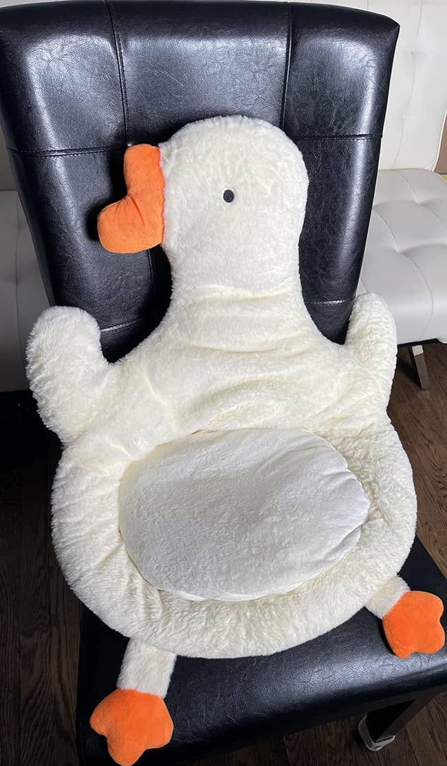 plush duck cushion on reviewer's chair