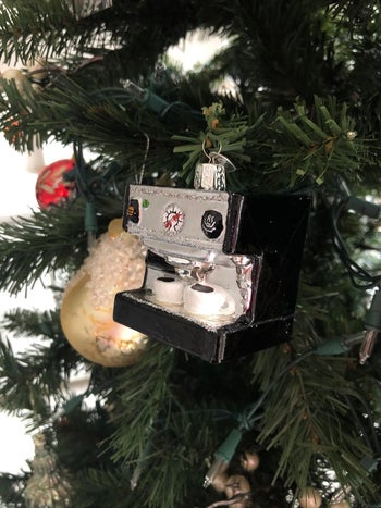 a reviewer's ornament of an espresso machine