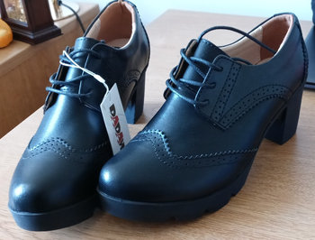 Reviewer image of black platform shoes