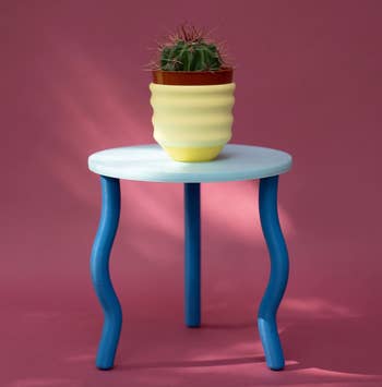 wavy legged blue plant stand