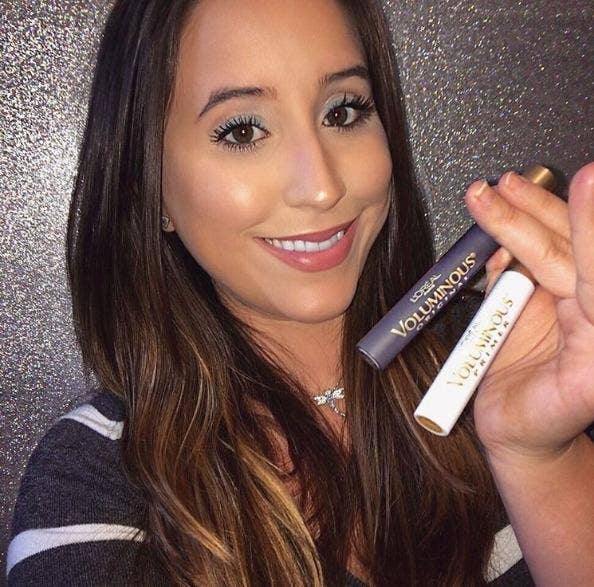 reviewer with brown eyes wearing the primer under L'Oreal Voluminous mascara