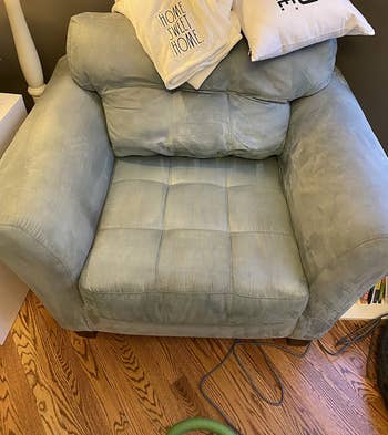 reviewer after image of the same armchair now clean