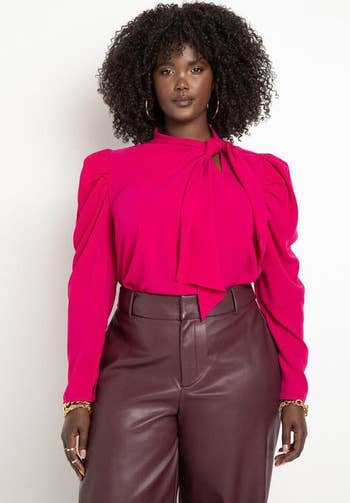  model wearing the blouse in pink 