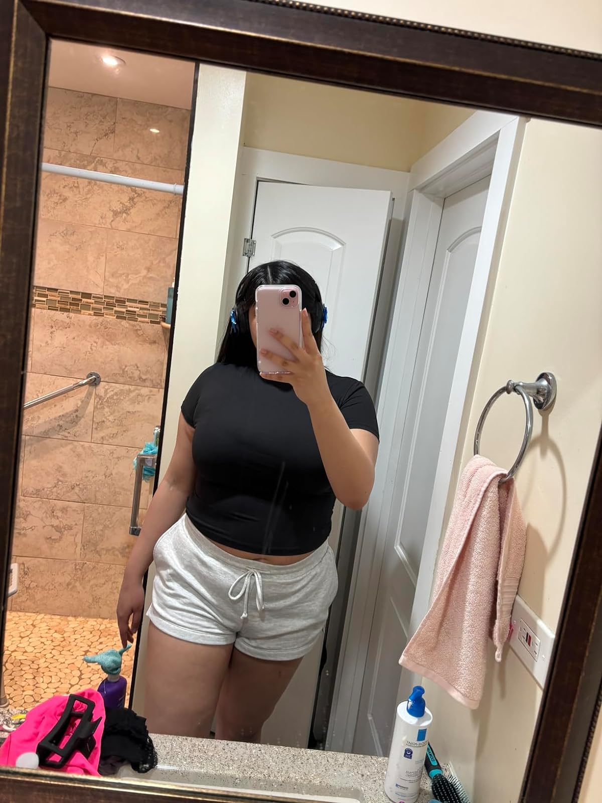 reviewer wearing the black top