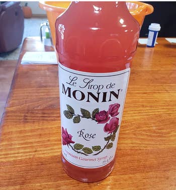 pink rose-flavored syrup in a bottle 