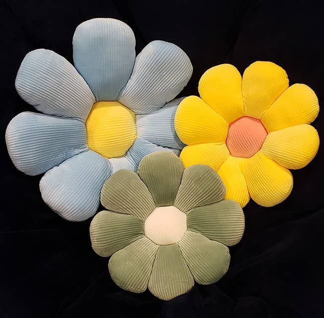 reviewer image of three flower pillows