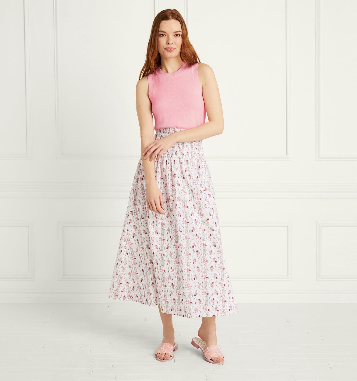 model in white and pink floral print skirt